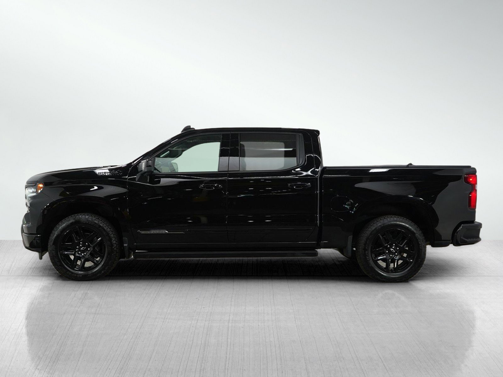 Used 2024 Chevrolet Silverado 1500 High Country with VIN 1GCUDJE83RZ287255 for sale in White Bear Lake, Minnesota