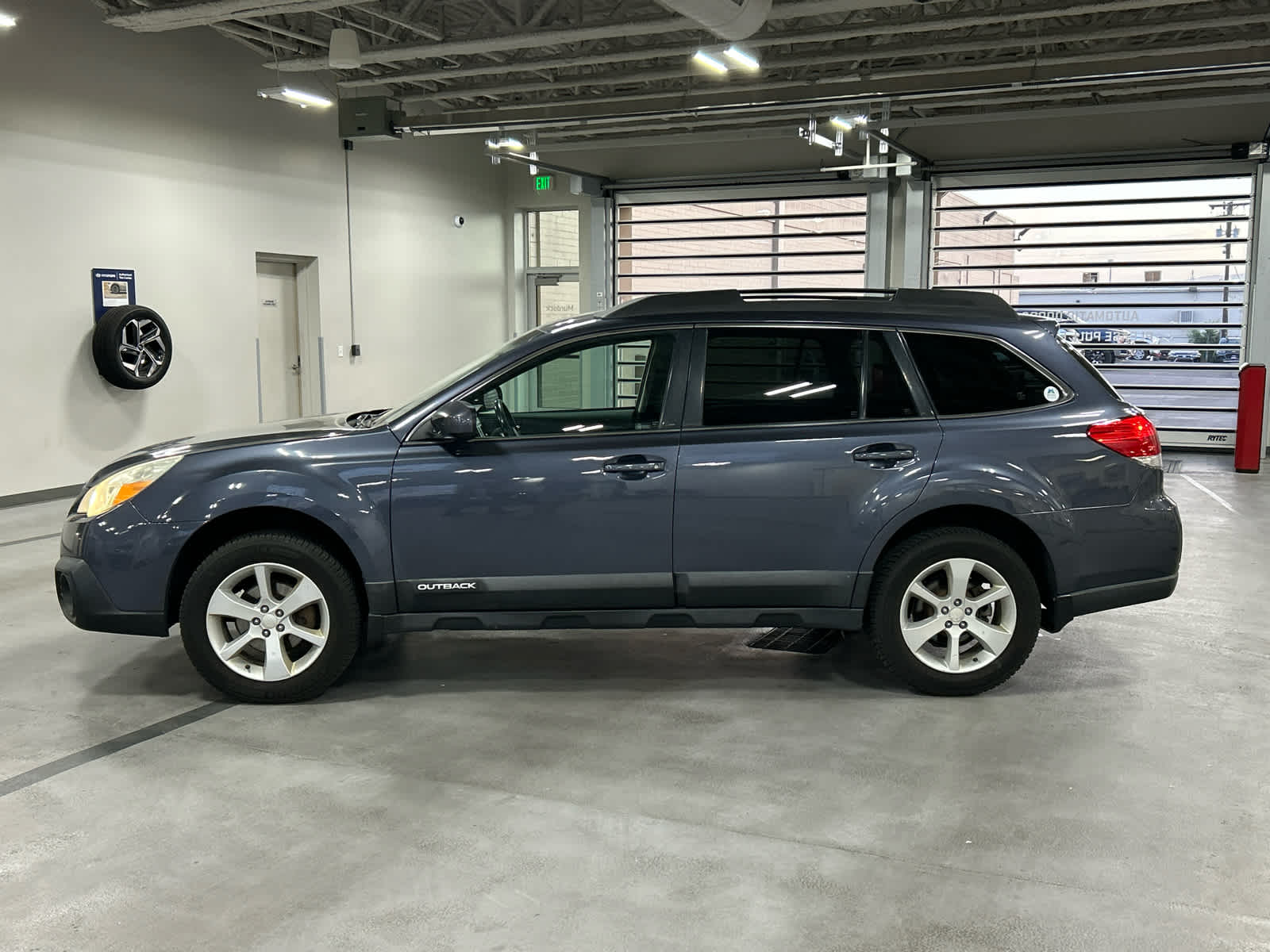 Used 2014 Subaru Outback 2.5i Premium with VIN 4S4BRCCCXE3272983 for sale in Murray, UT