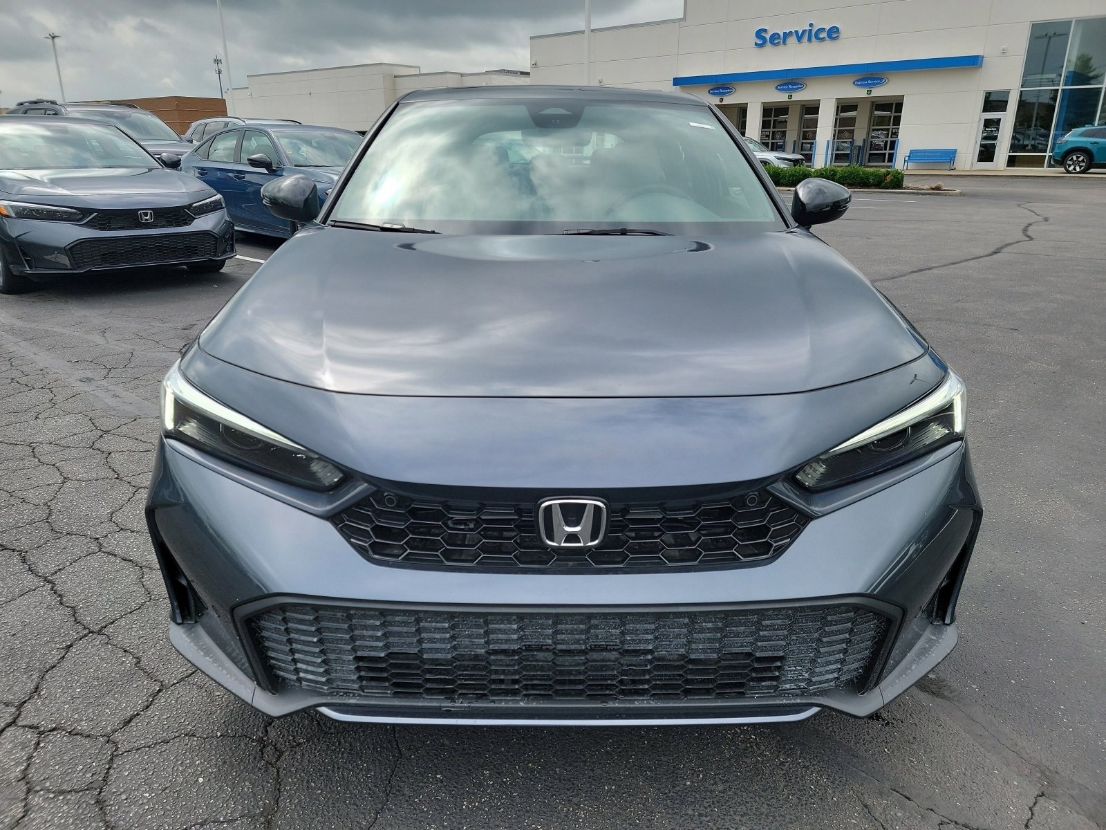 2026 Honda Civic Sport Touring Hatchback Hybrid photo 2