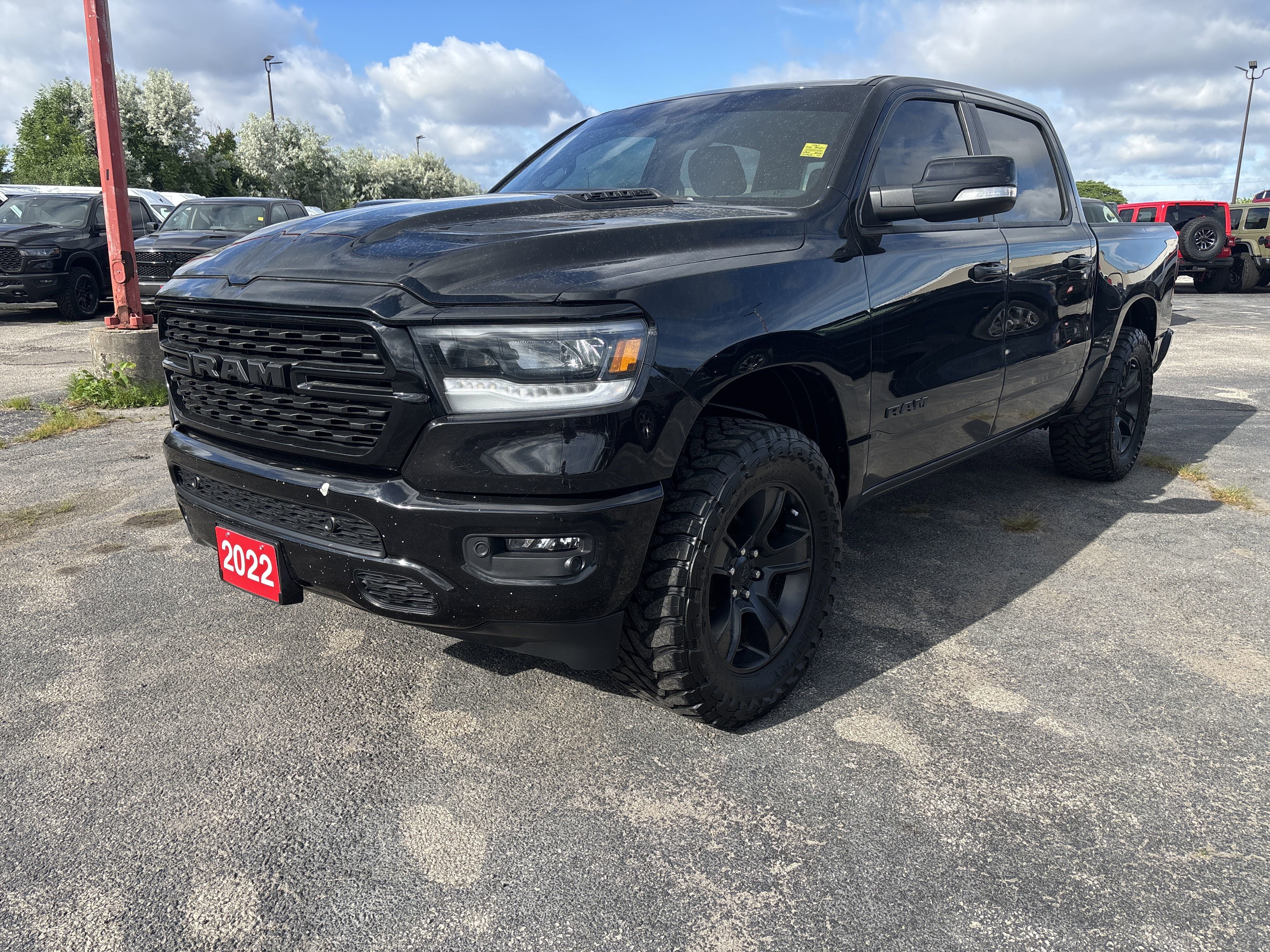 Used 2022 Diamond Black Crystal Pearlcoat Ram Sport image 1