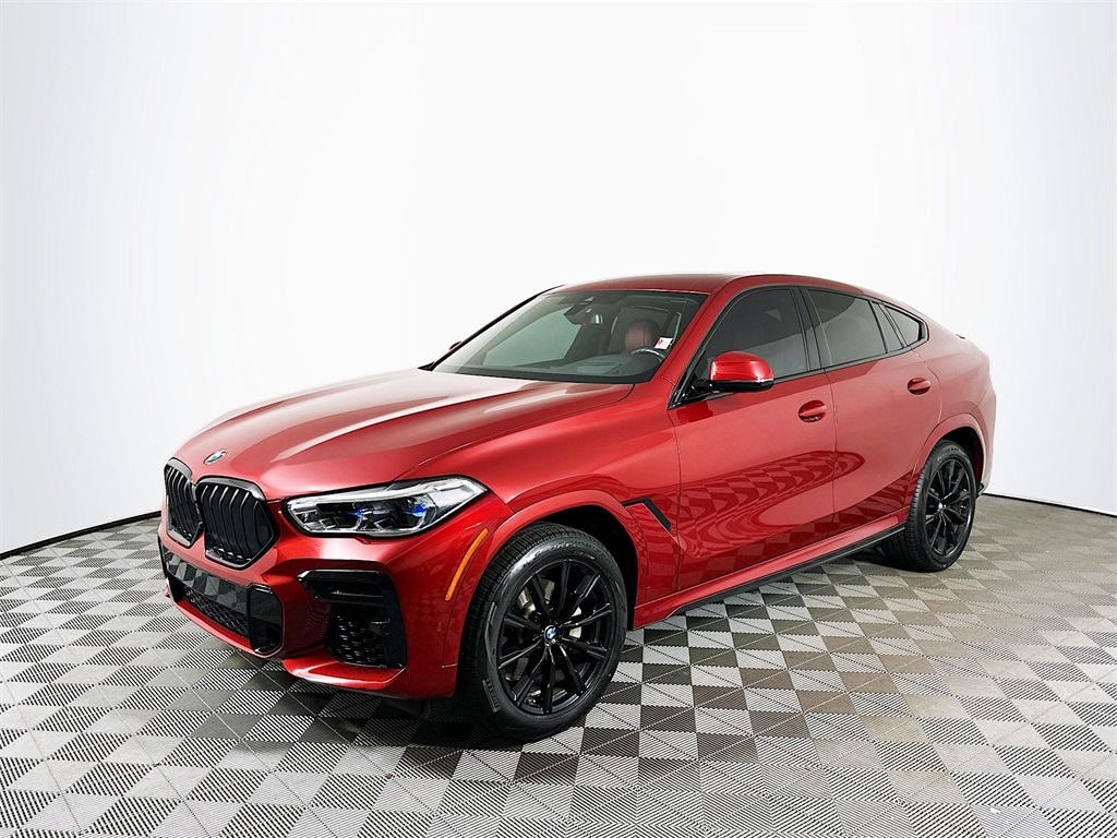 Certified Used 2022 Flamenco Red Metallic BMW xDrive40i image 1