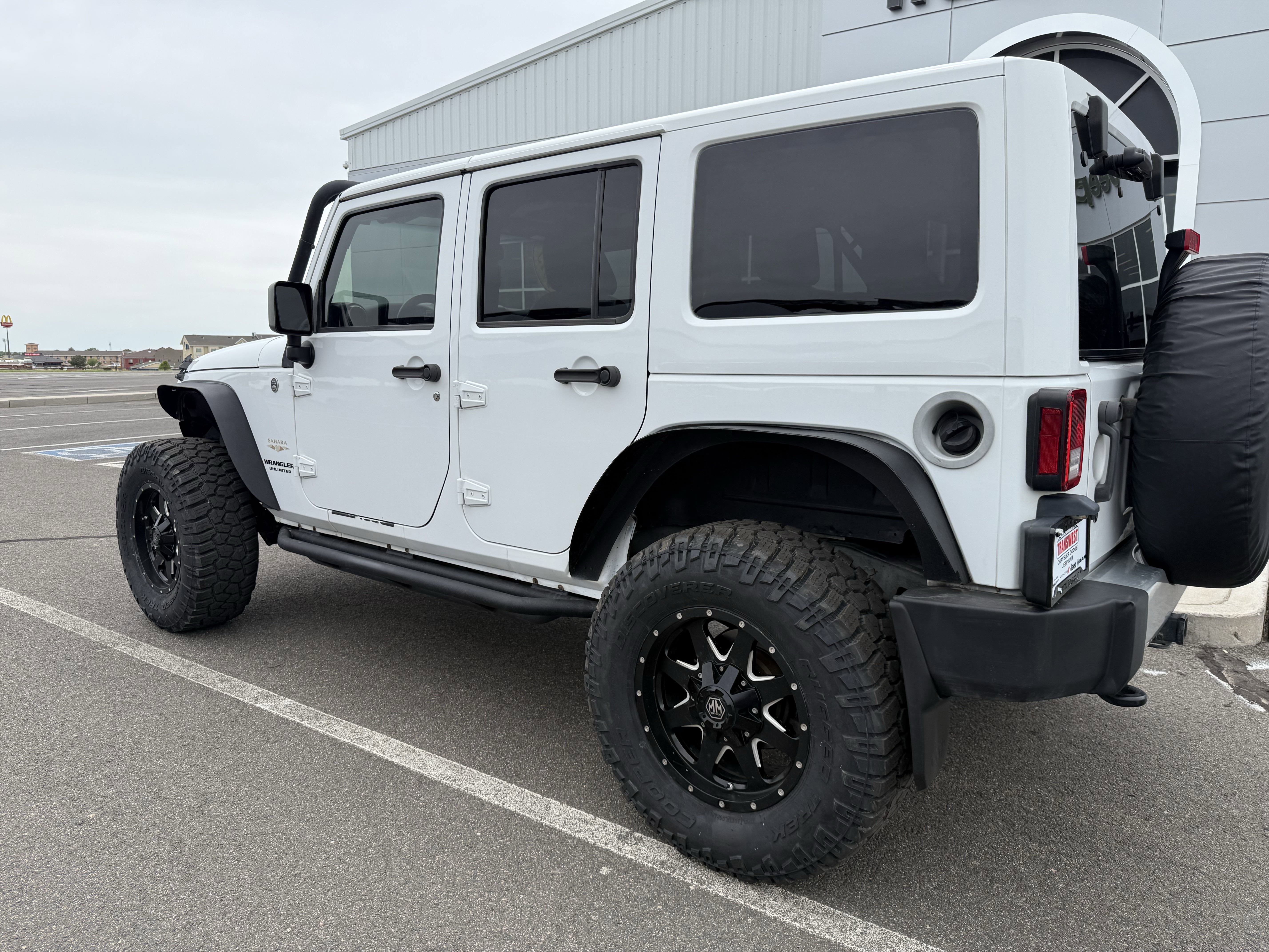 Used 2015 Jeep Wrangler Unlimited Sahara with VIN 1C4BJWEG9FL636292 for sale in Limon, CO