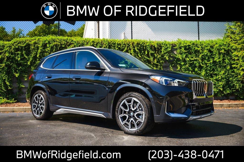 Used 2025 Black Sapphire Metallic BMW xDrive28i image 1