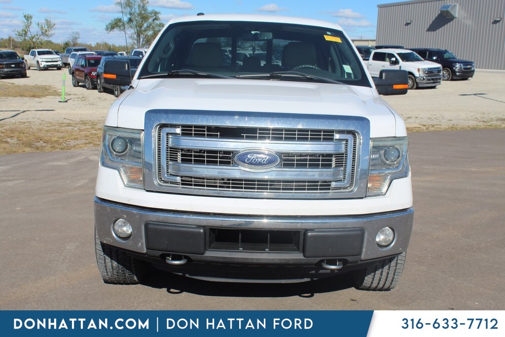 Used 2014 Ford F-150 XLT with VIN 1FTFW1EF4EKG45211 for sale in Augusta, KS