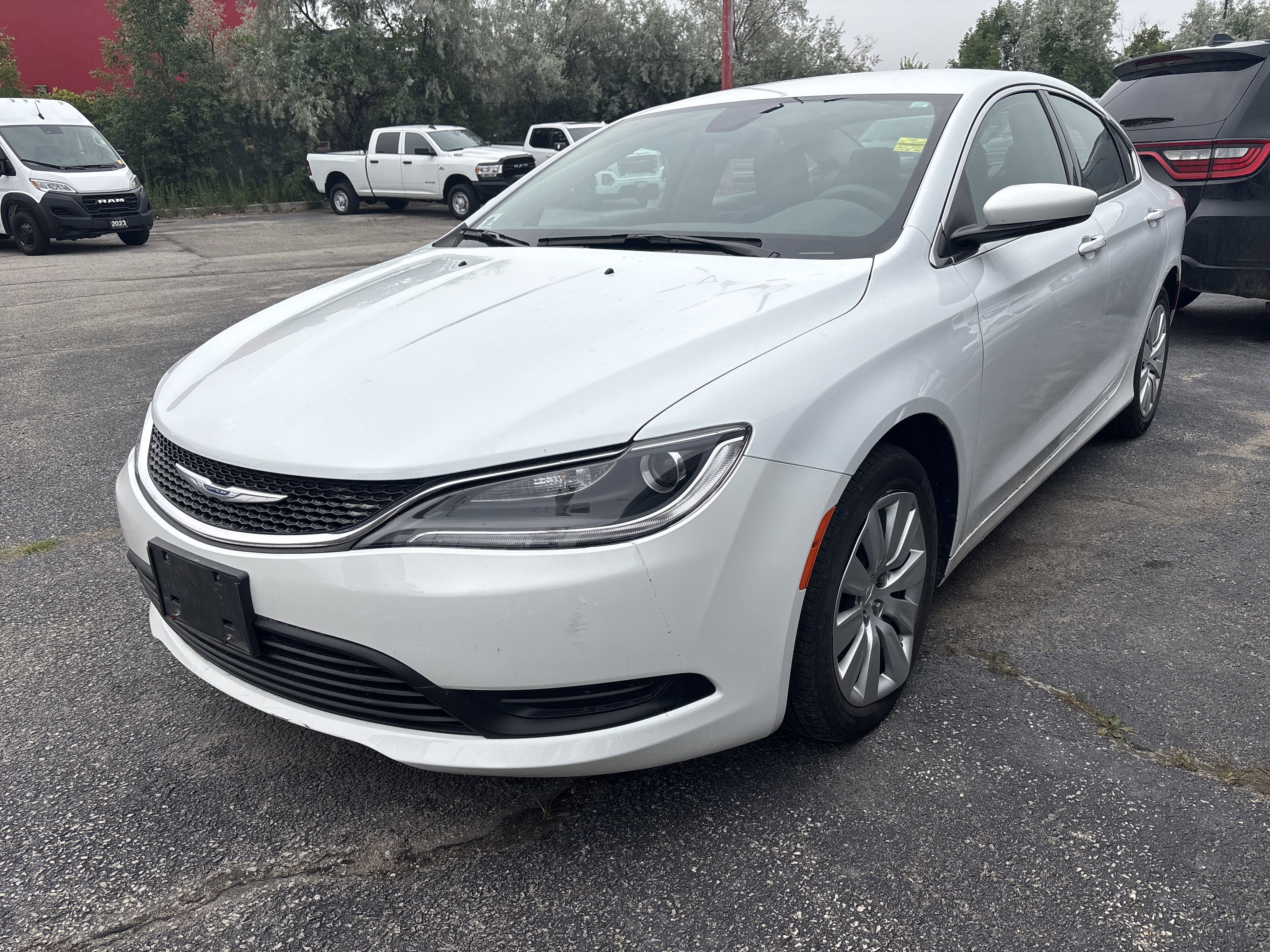 Used 2015 White Chrysler LX image 1