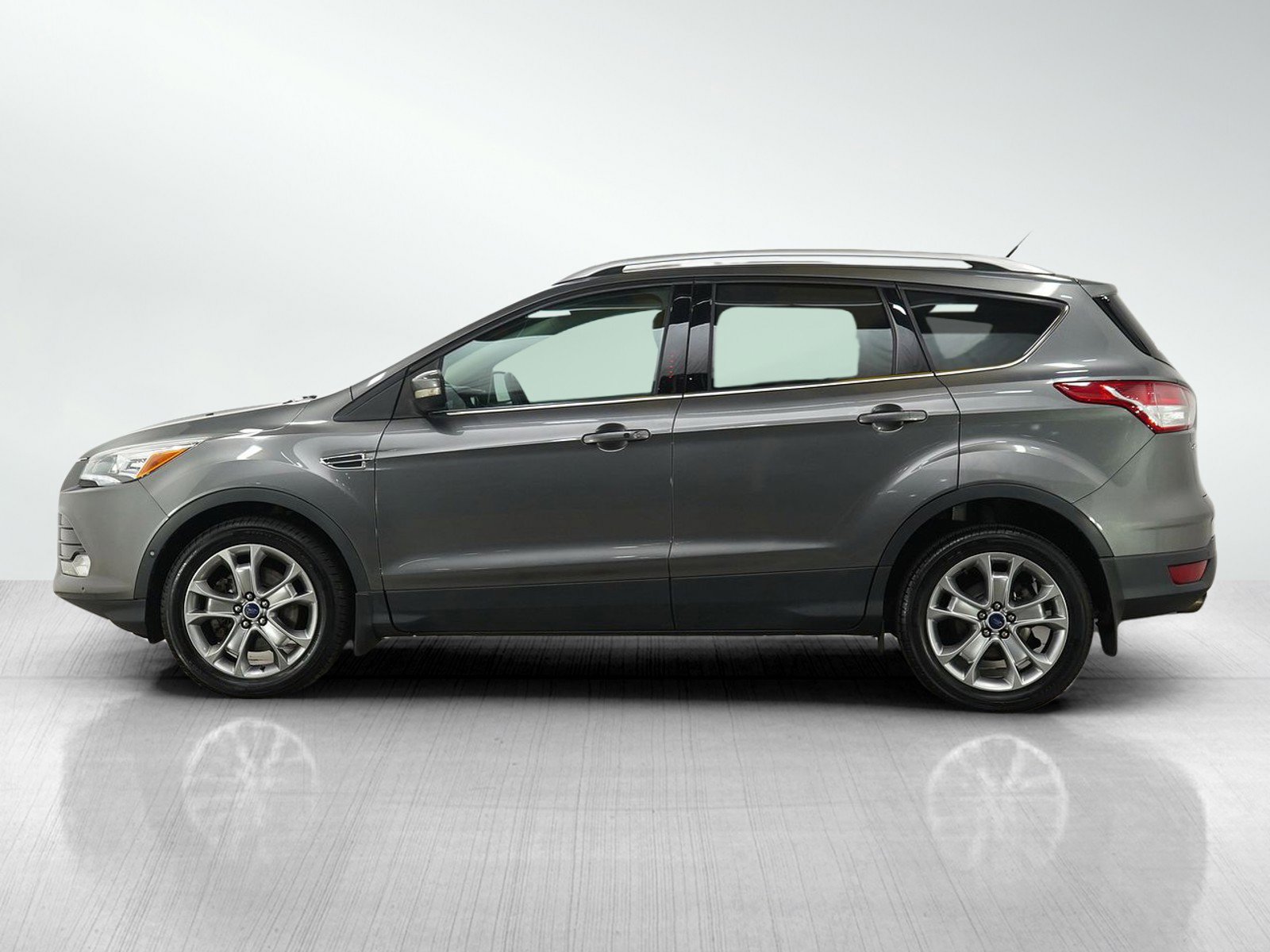 Used 2014 Ford Escape Titanium with VIN 1FMCU9J92EUE13200 for sale in Burnsville, Minnesota