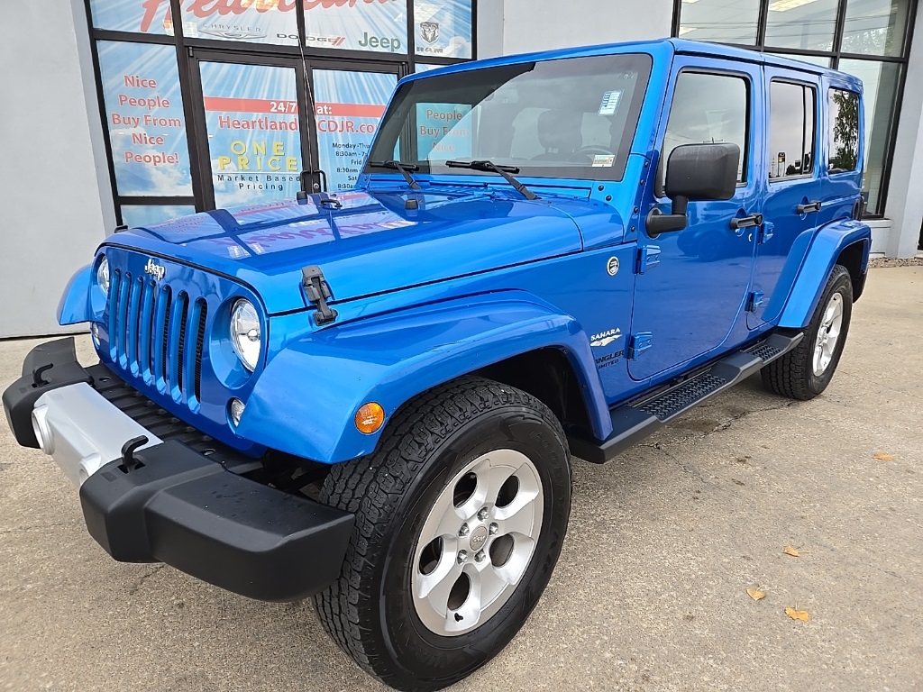 Used 2015 Jeep Wrangler Unlimited Sahara with VIN 1C4BJWEG1FL645634 for sale in Kansas City