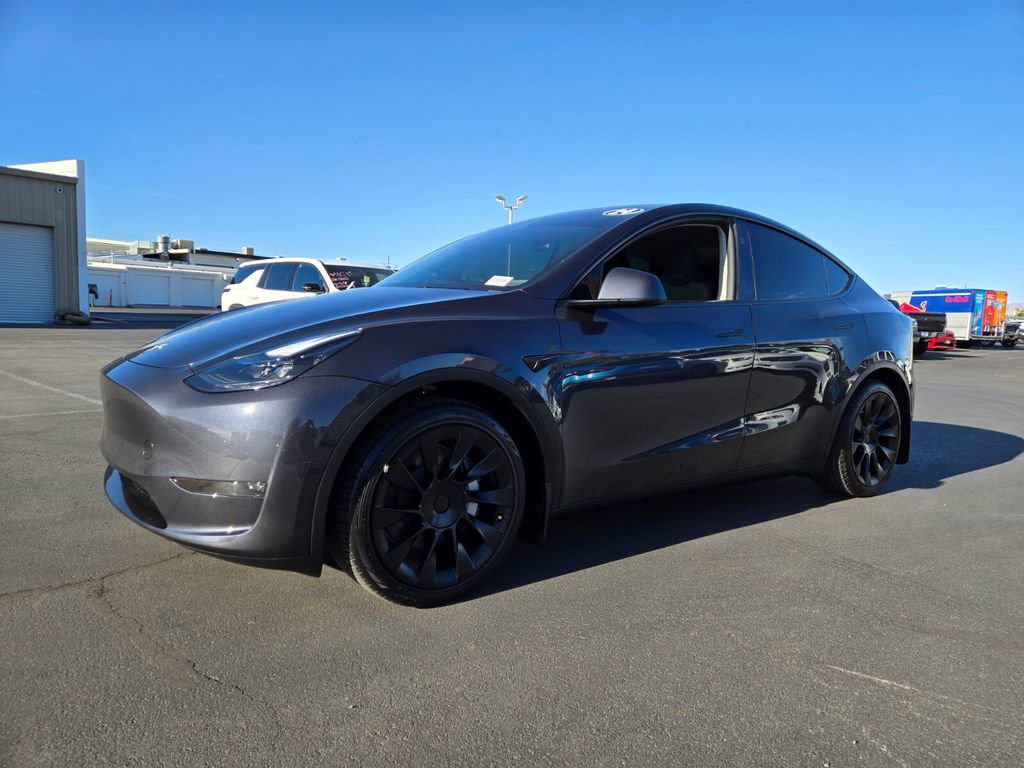 Used 2024 Tesla Model Y Long Range with VIN 7SAYGDEE2RA285129 for sale in Kansas City