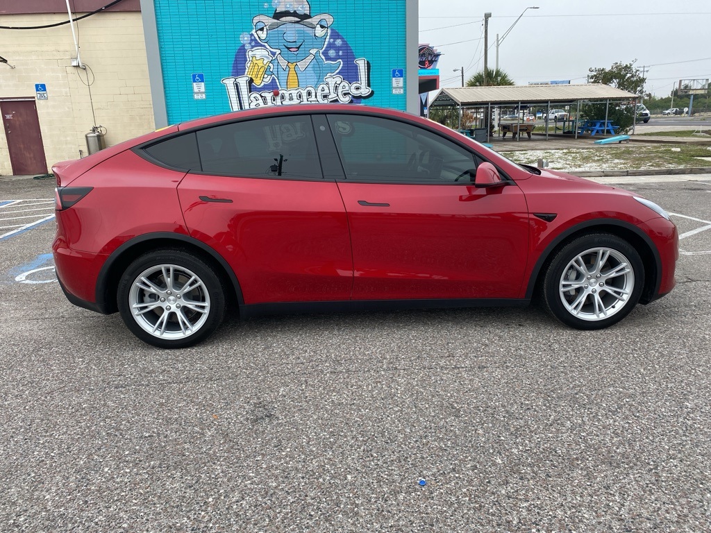 Used 2021 Tesla Model Y Long Range with VIN 5YJYGDEE2MF142660 for sale in Tampa, FL