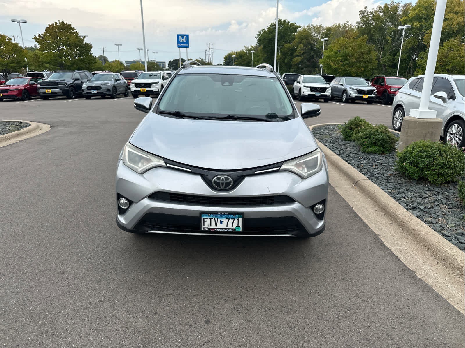 Used 2017 Toyota RAV4 XLE with VIN 2T3RFREV8HW662639 for sale in Hopkins, Minnesota