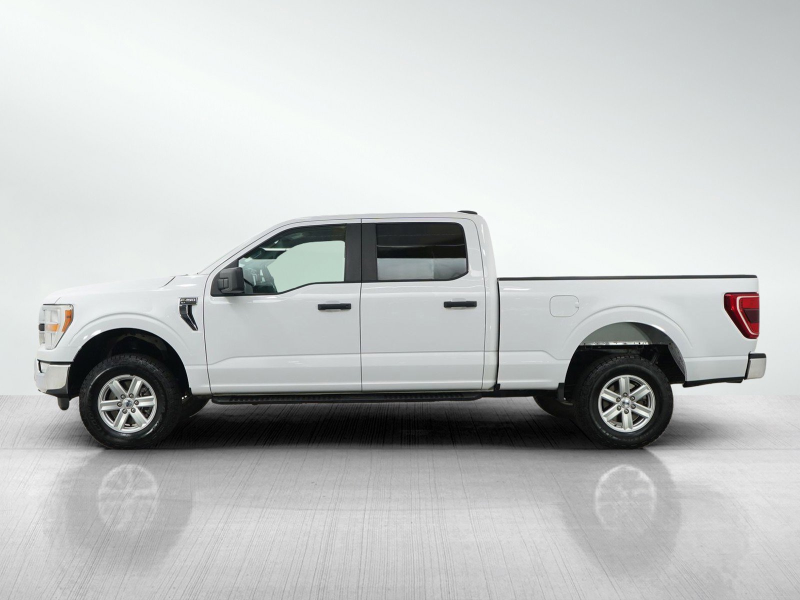 Used 2021 Ford F-150 XLT with VIN 1FTFW1E52MKE27256 for sale in Minneapolis, Minnesota
