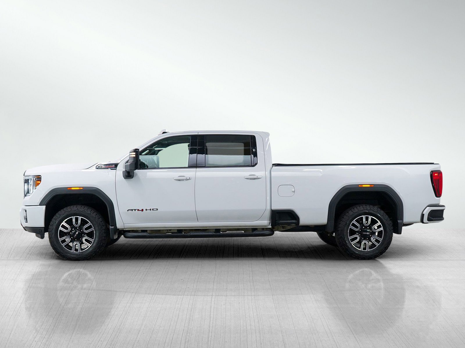 Used 2023 GMC Sierra 2500HD AT4 with VIN 1GT19PEY0PF250038 for sale in White Bear Lake, Minnesota