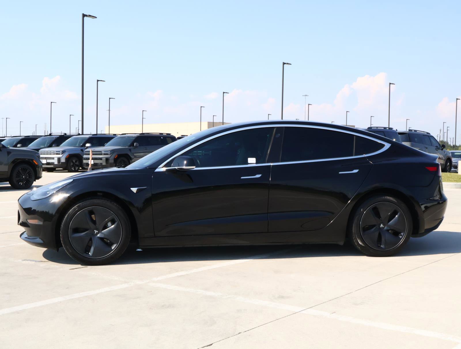 Used 2019 Tesla Model 3 Base with VIN 5YJ3E1EAXKF323918 for sale in Friendswood, TX