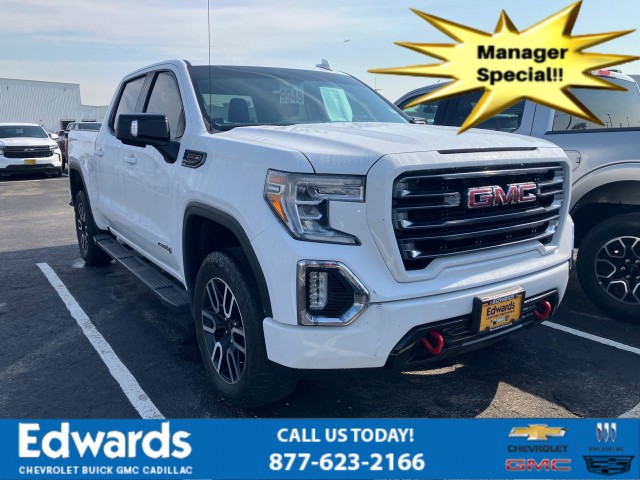 PRE-OWNED 2021 GMC SIERRA 1500 AT4