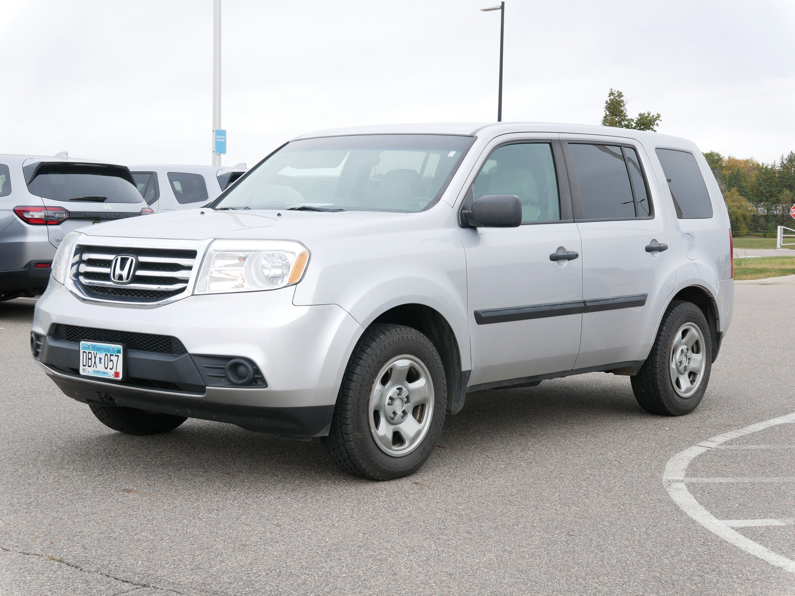 Used 2015 Honda Pilot LX with VIN 5FNYF4H2XFB032723 for sale in Waite Park, Minnesota