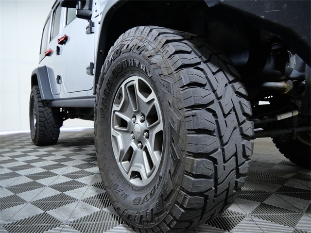 Used 2016 Jeep Wrangler Unlimited Rubicon with VIN 1C4HJWFGXGL149242 for sale in Apple Valley, Minnesota