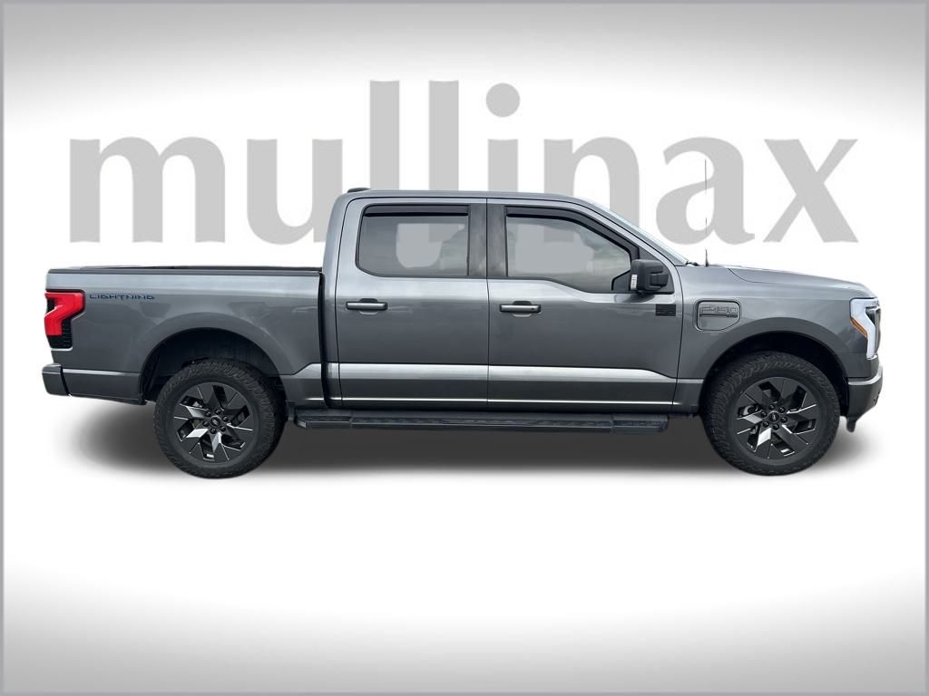 Certified 2023 Ford F-150 Lightning XLT with VIN 1FT6W1EV8PWG26910 for sale in Olympia, WA