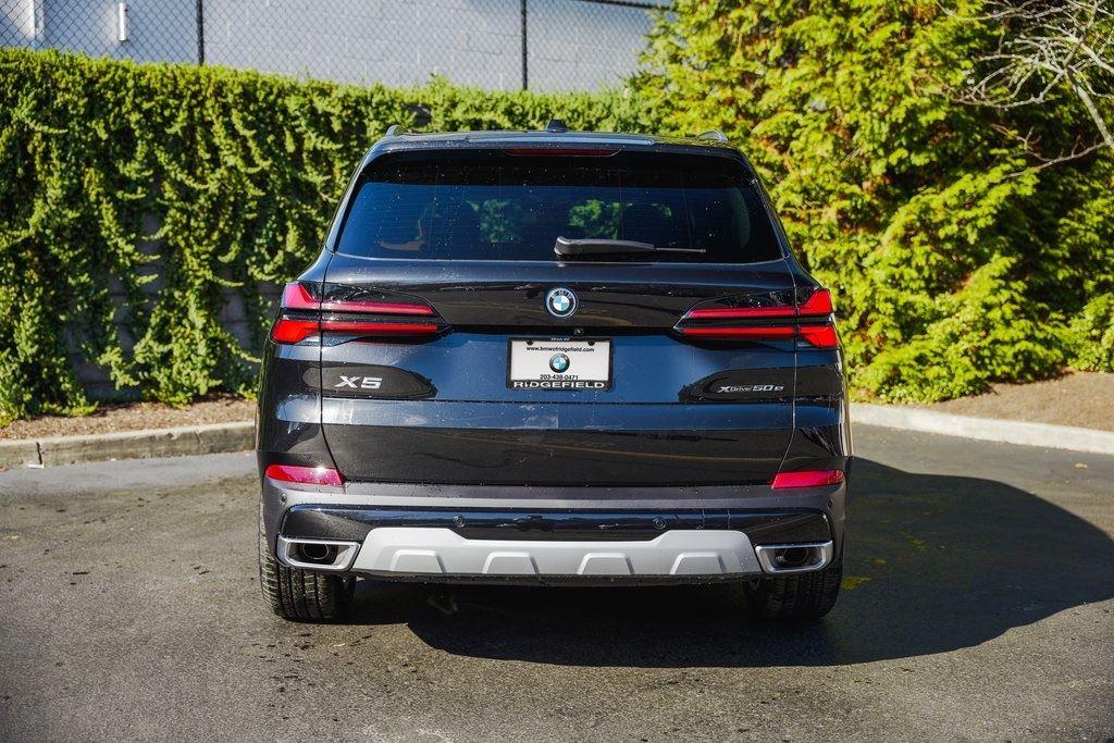 New 2025 Black Sapphire Metallic BMW xDrive50e image 8