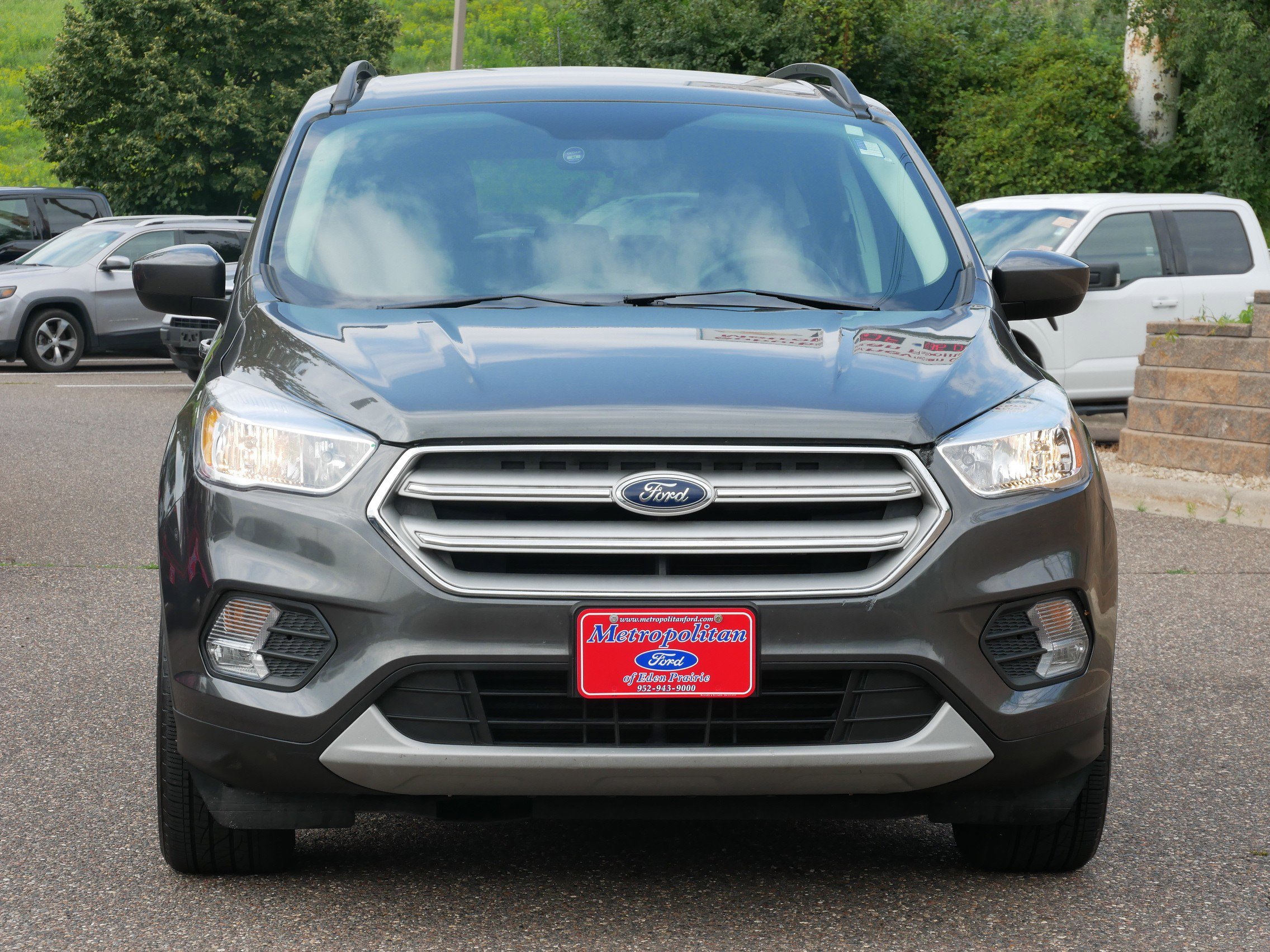 Used 2018 Ford Escape SE with VIN 1FMCU9GD3JUA64392 for sale in Eden Prairie, Minnesota