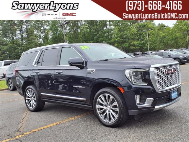 Used 2024 Midnight Blue Metallic GMC Denali image 1