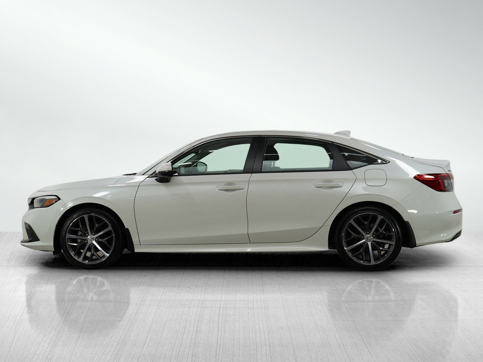 Used 2023 Honda Civic Touring with VIN 2HGFE1F99PH319217 for sale in Burnsville, Minnesota