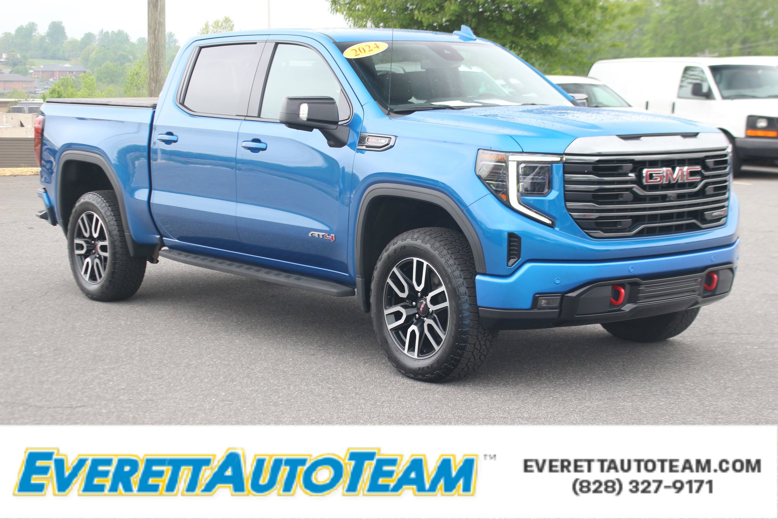 Used 2024 Dynamic Blue Metallic GMC AT4 image 1