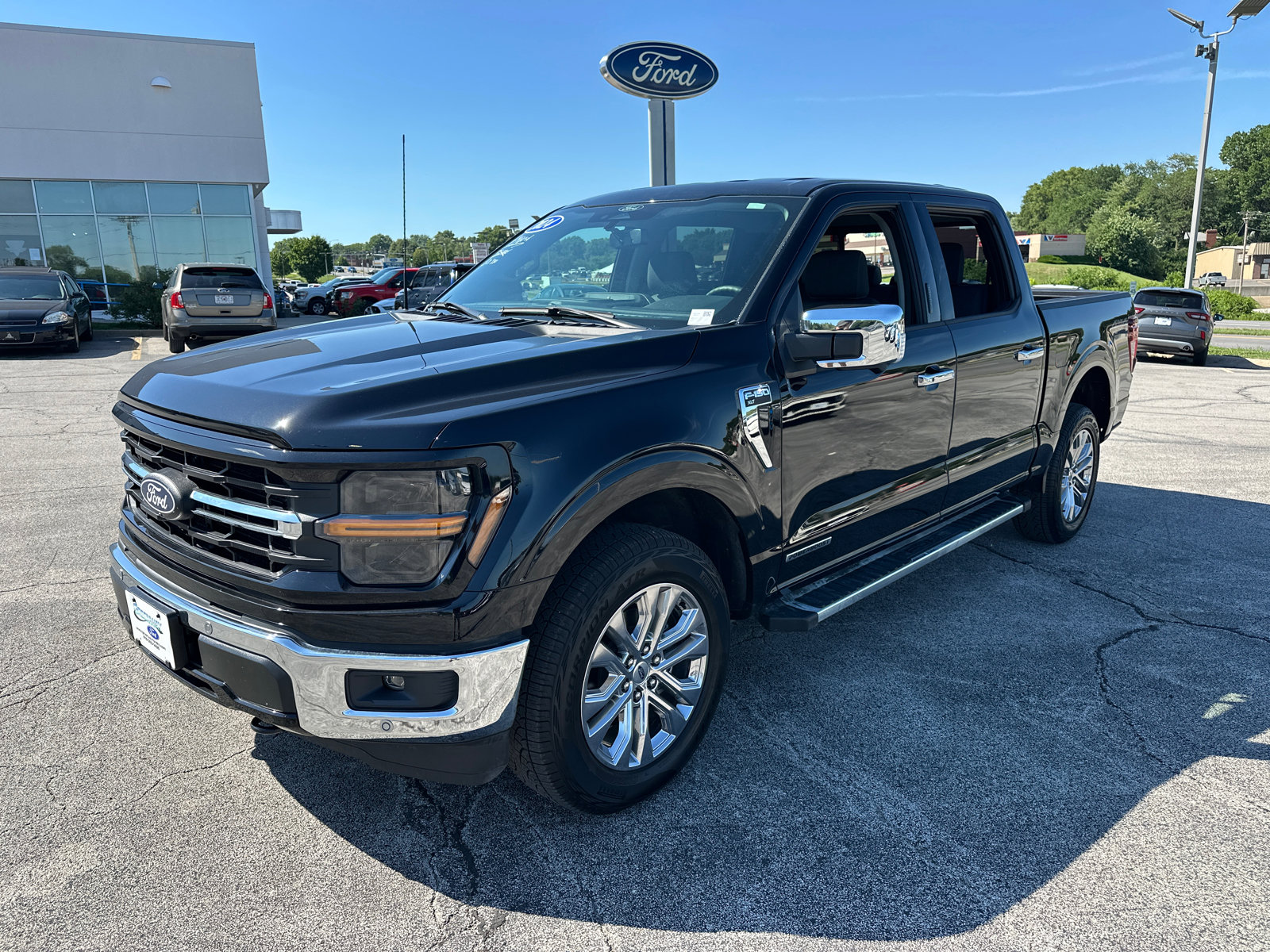 Used 2024 Ford F-150 XLT with VIN 1FTFW3LD7RFB12443 for sale in Kansas City