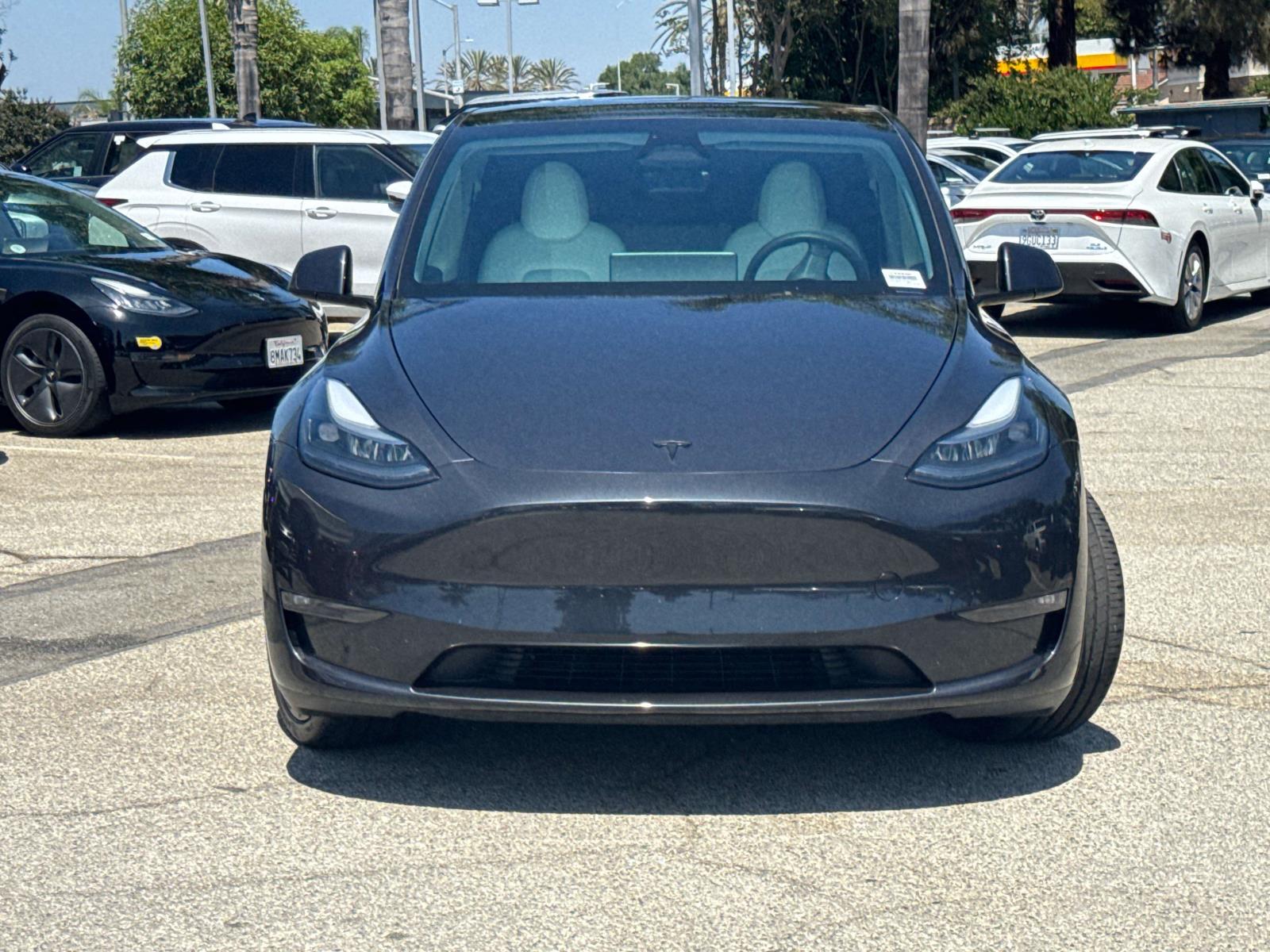 Used 2024 Tesla Model Y Long Range with VIN 7SAYGAEE9RF204886 for sale in Cerritos, CA