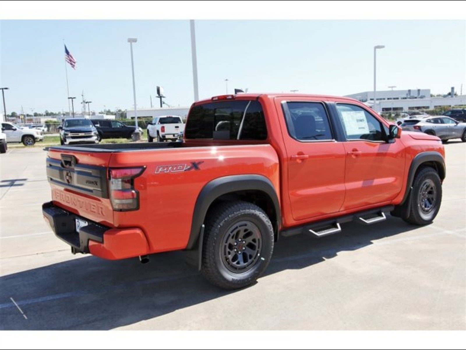 2026 Nissan Frontier Crew Cab PRO-X® Orange at Robbins Nissan