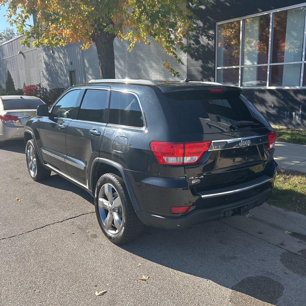 Used 2013 Jeep Grand Cherokee Overland with VIN 1C4RJFCG4DC599912 for sale in Fowlerville, MI