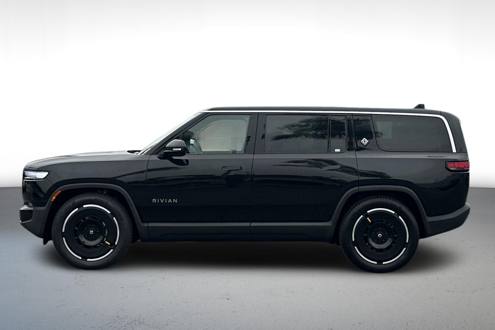 Used 2025 Rivian R1S Adventure with VIN 7PDSGBBA7SN049975 for sale in Long Beach, CA