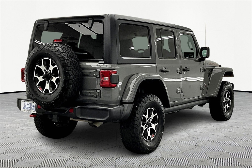 Used 2023 Jeep Wrangler 4-Door Rubicon with VIN 1C4HJXFGXPW657358 for sale in Kansas City