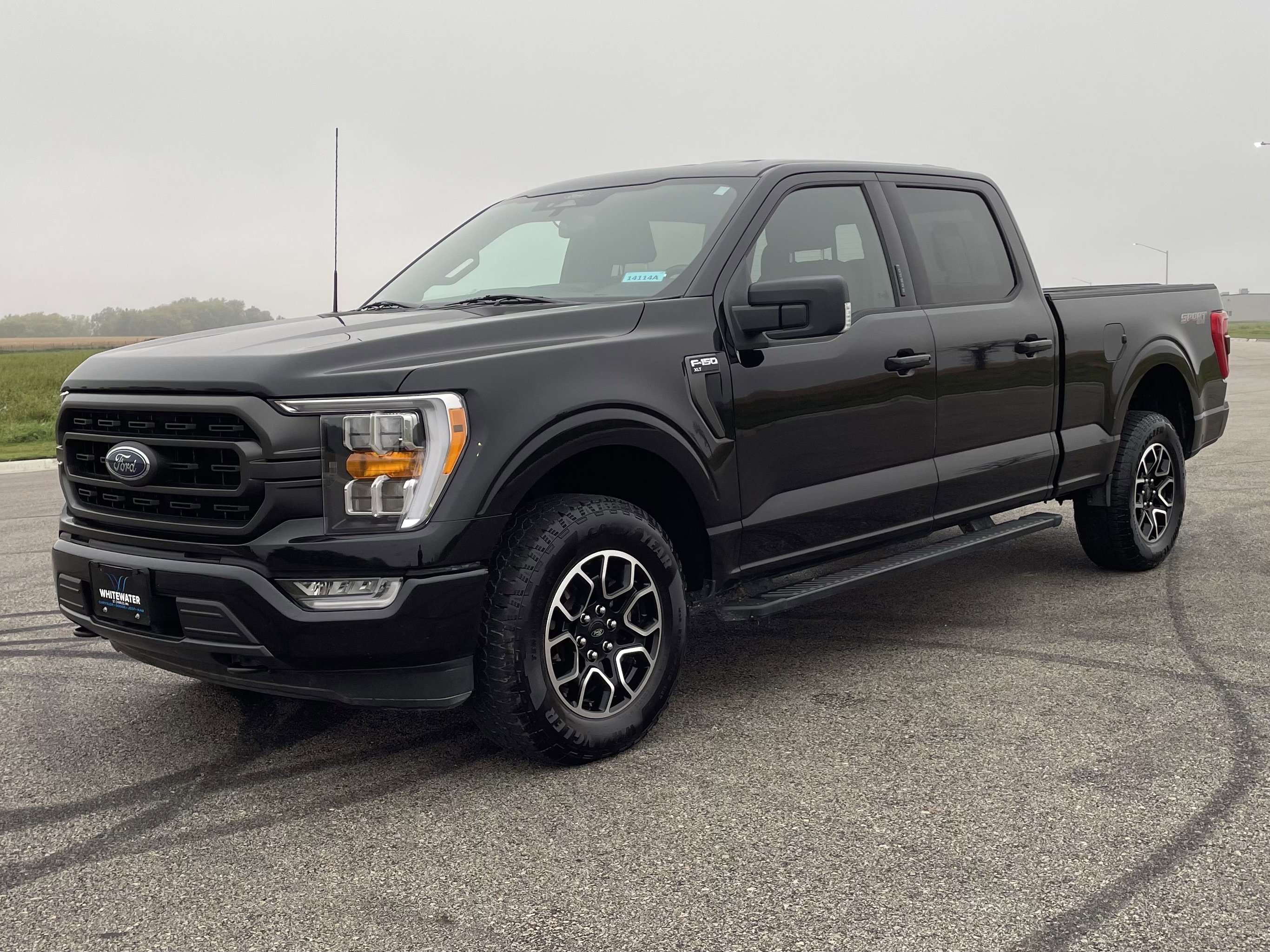 Used 2022 Ford F-150 XLT with VIN 1FTFW1E81NKF01374 for sale in Saint Charles, Minnesota