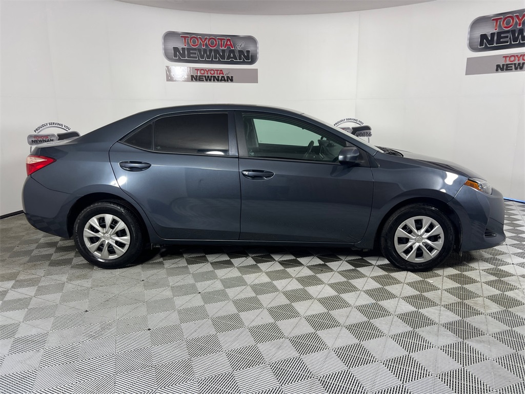 Used 2017 Toyota Corolla L with VIN 5YFBURHE5HP674938 for sale in Newnan, GA