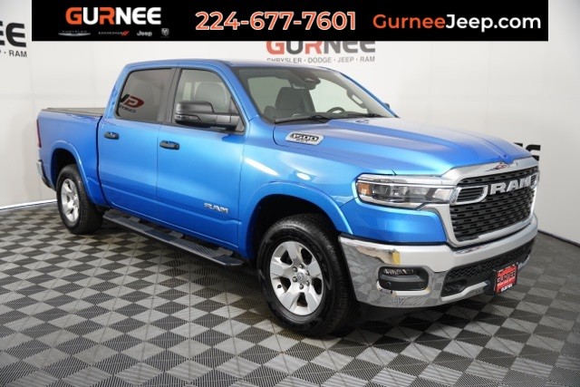 PRE-OWNED 2025 RAM 1500 BIG HORN/LONE STAR WITH NAVIGATION & 4WD
