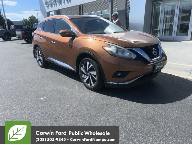Used 2015 Orange Nissan Platinum image 1