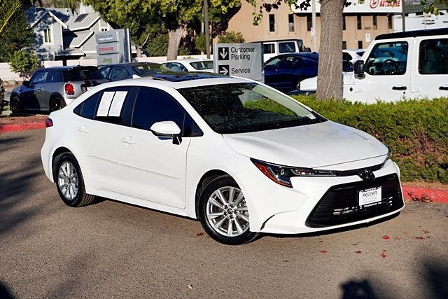 Used 2024 White Toyota LE image 2