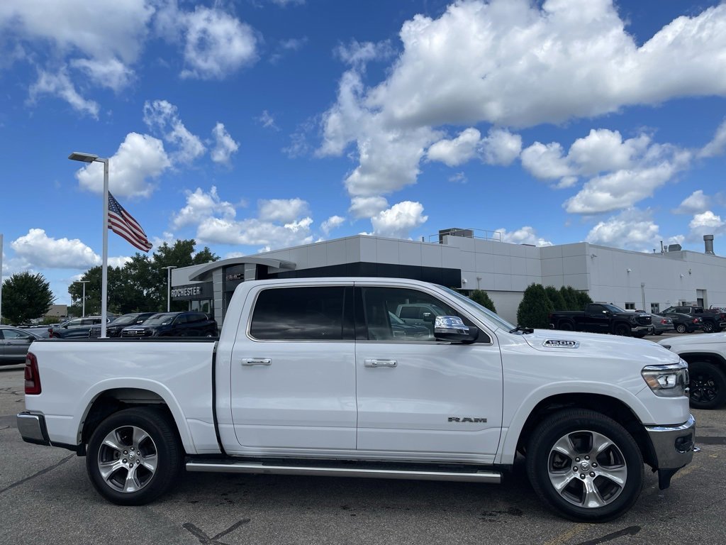 Used 2021 RAM Ram 1500 Pickup Laramie with VIN 1C6SRFJTXMN652859 for sale in Rochester, Minnesota