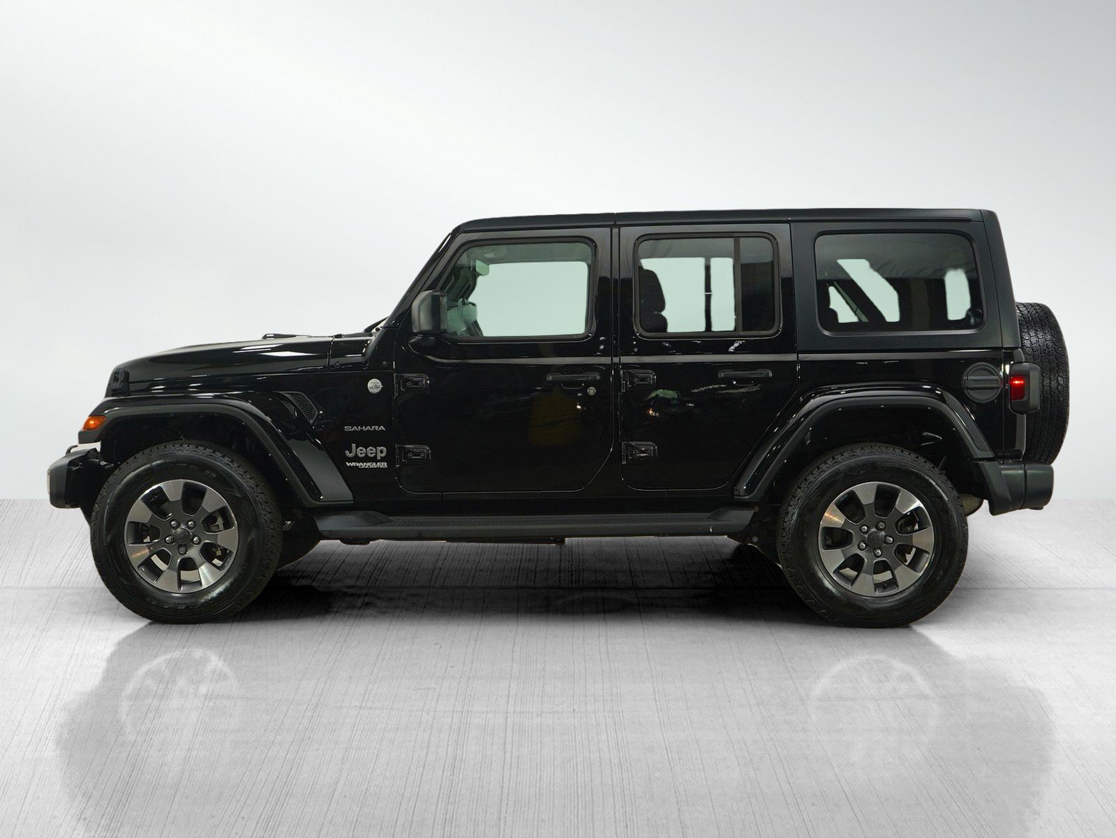 Used 2021 Jeep Wrangler Unlimited Sahara with VIN 1C4HJXEG6MW864486 for sale in Hopkins, Minnesota