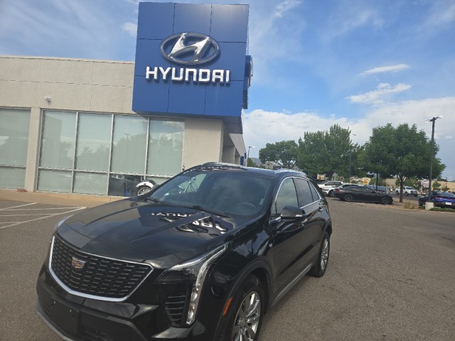Used 2021 Stellar Black Metallic Cadillac AWD Premium Luxury image 1