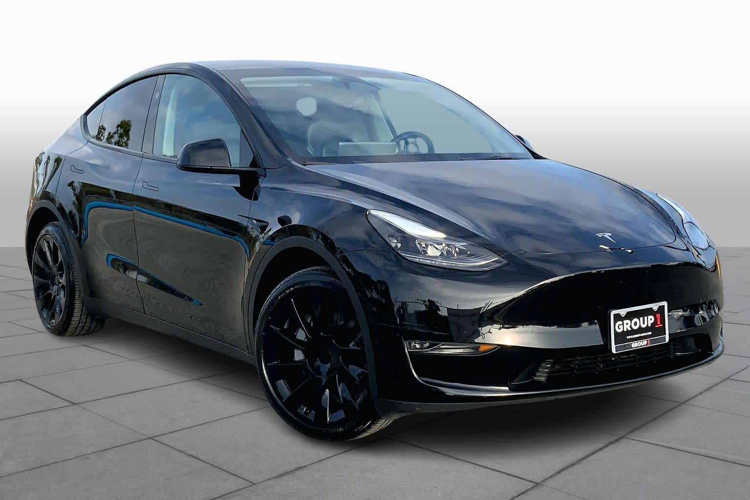 Used 2023 Tesla Model Y Long Range with VIN 7SAYGDEE5PA174300 for sale in Houston, TX
