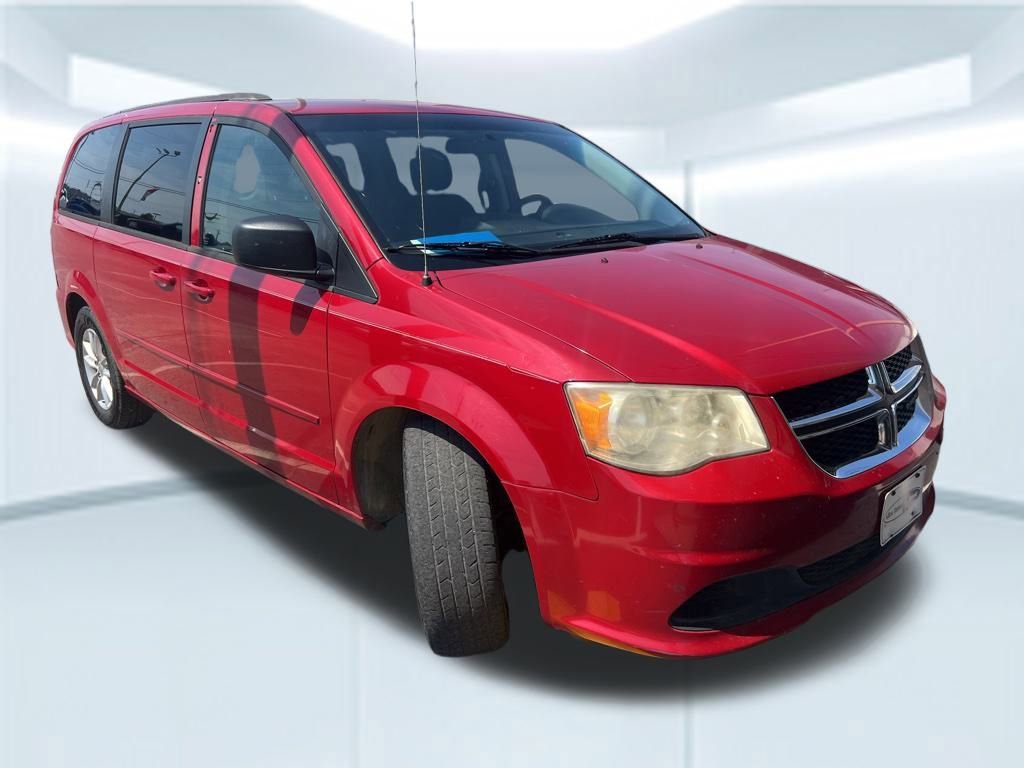 Used 2014 Dodge Grand Caravan SXT with VIN 2C4RDGCG3ER128095 for sale in Pensacola, FL
