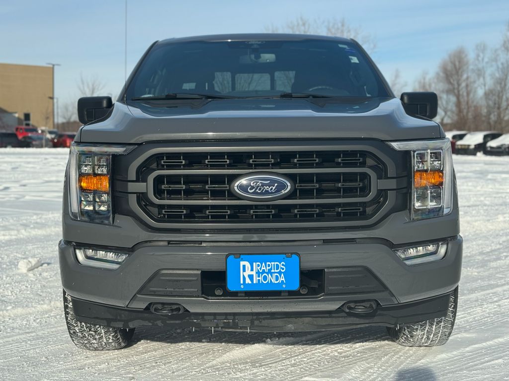 Used 2021 Ford F-150 XLT with VIN 1FTFW1E58MKD77740 for sale in Coon Rapids, Minnesota