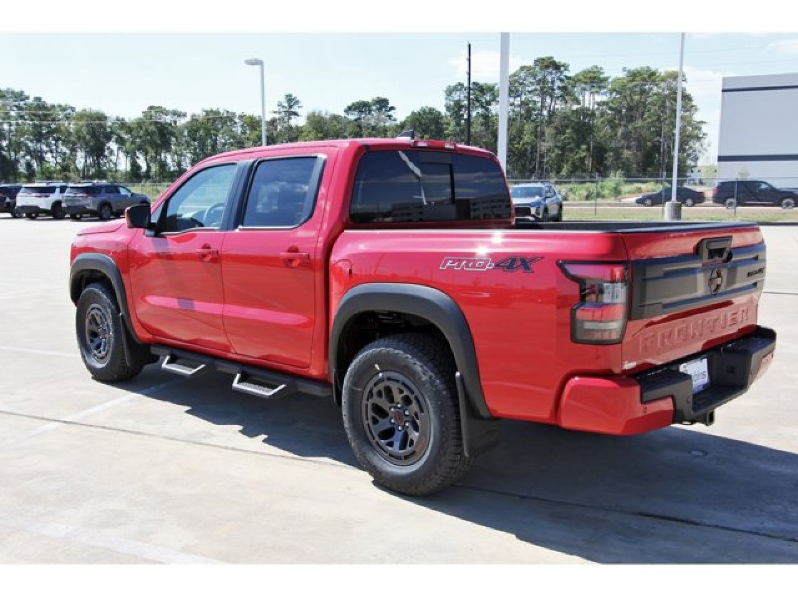 2026 Nissan Frontier Crew Cab PRO-4X® Red at Robbins Nissan