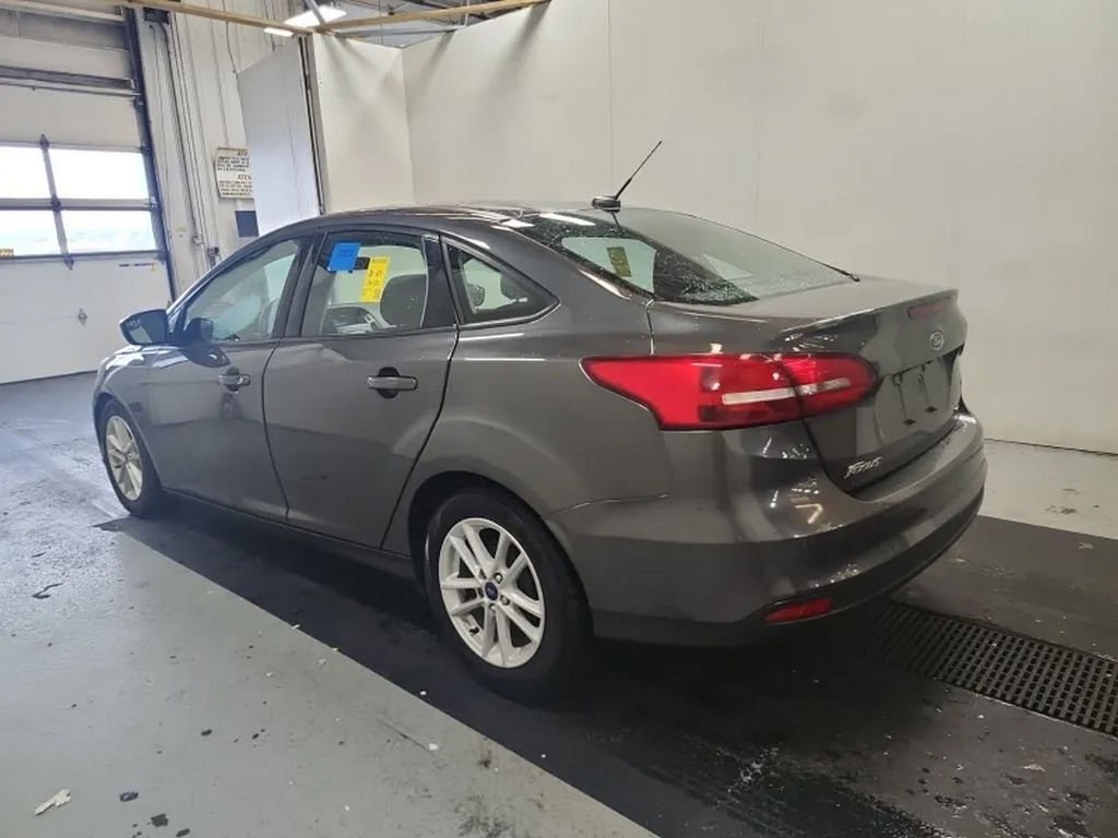Used 2018 Ford Focus SE with VIN 1FADP3F24JL233974 for sale in Parma, OH