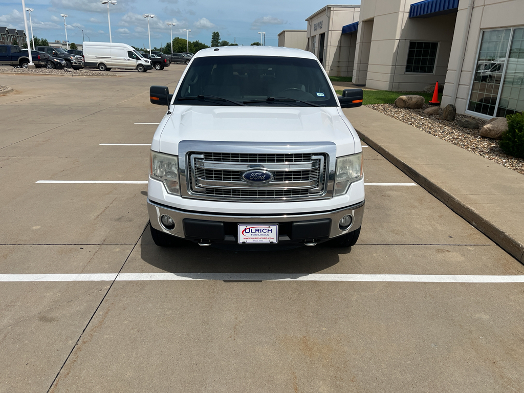 Used 2014 Ford F-150 XLT with VIN 1FTFW1EF9EKD04242 for sale in Pella, IA