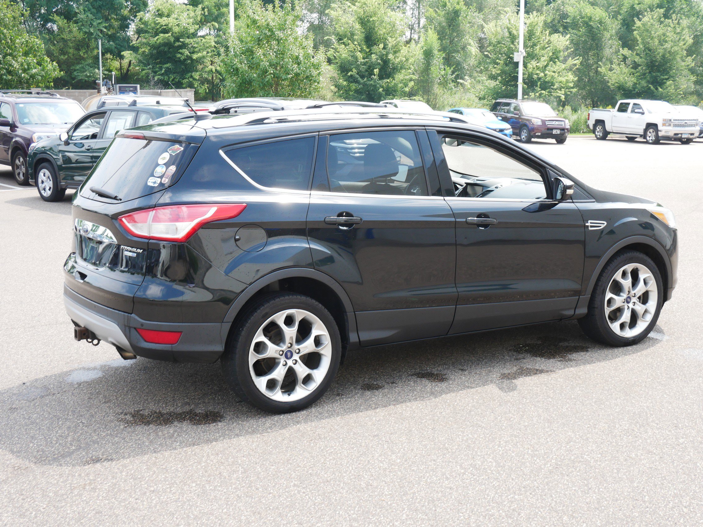 Used 2014 Ford Escape Titanium with VIN 1FMCU9J99EUA45422 for sale in Coon Rapids, Minnesota