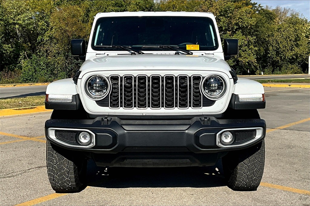 Used 2024 Jeep Wrangler 4-Door Sahara with VIN 1C4PJXEG5RW285198 for sale in Kansas City