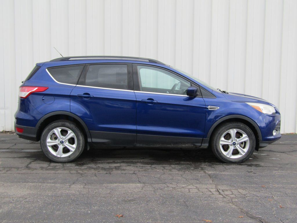 Used 2014 Ford Escape SE with VIN 1FMCU9GX9EUD17148 for sale in Kansas City