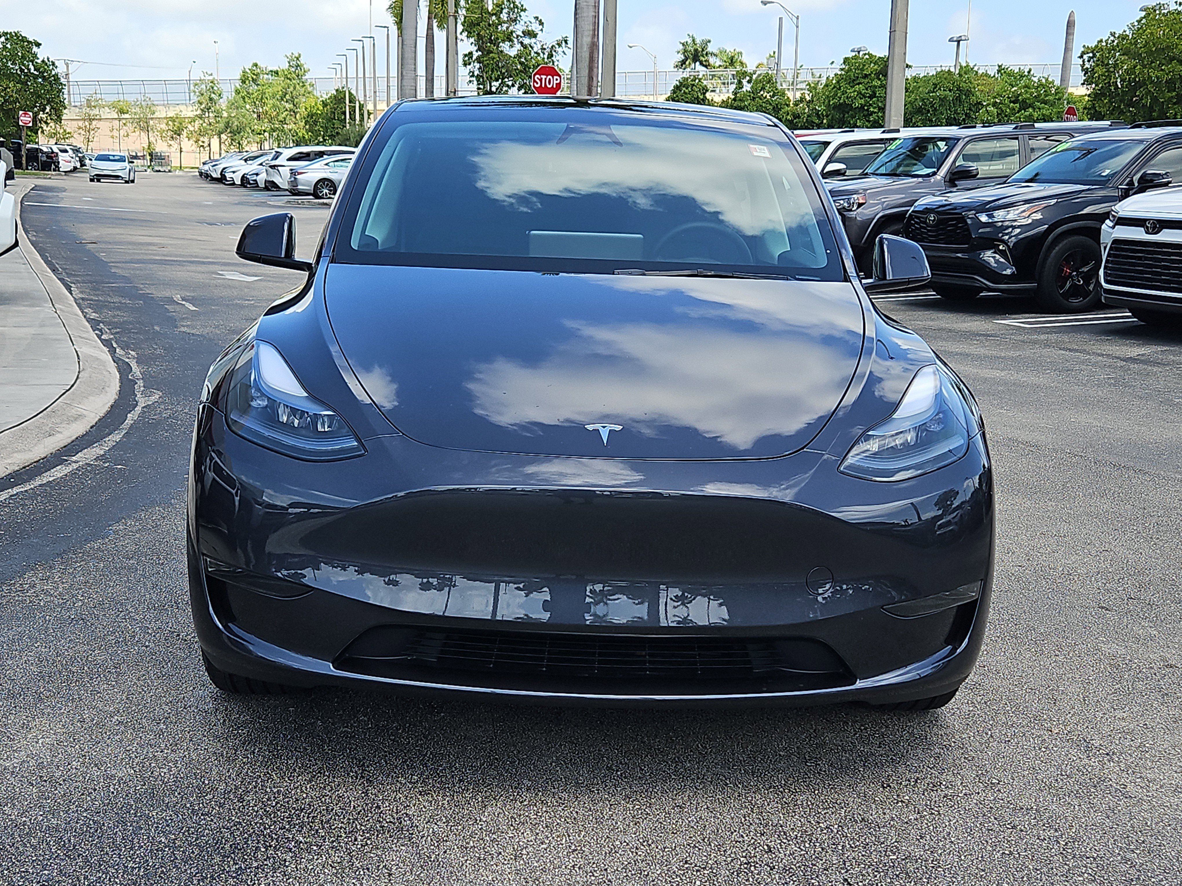 Used 2025 Tesla Model Y Long Range with VIN 7SAYGDED7SA377978 for sale in Doral, FL